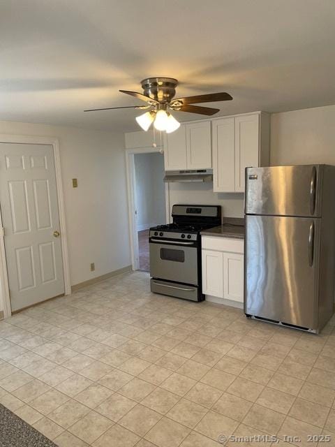 302 High St, Naugatuck, CT 06770 - kitchen with a ceiling fan, under cabinet range hood, stainless steel appliances, and white cabinetry