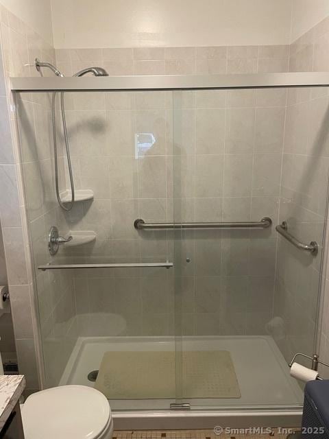 302 High St, Naugatuck, CT 06770 - full bath with a stall shower, vanity, and toilet