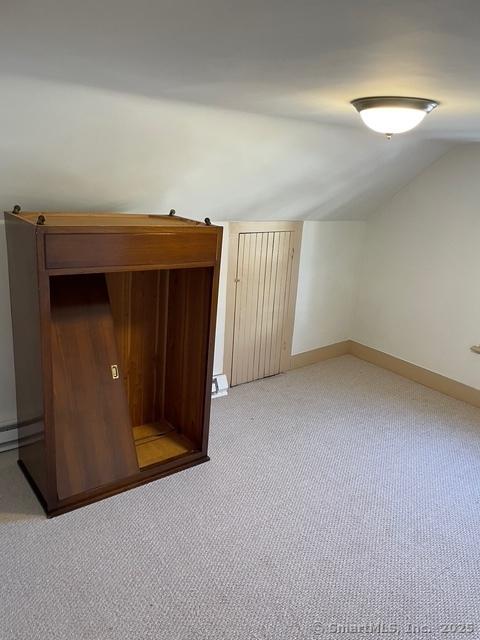 302 High St, Naugatuck, CT 06770 - additional living space featuring lofted ceiling, carpet flooring, and baseboards