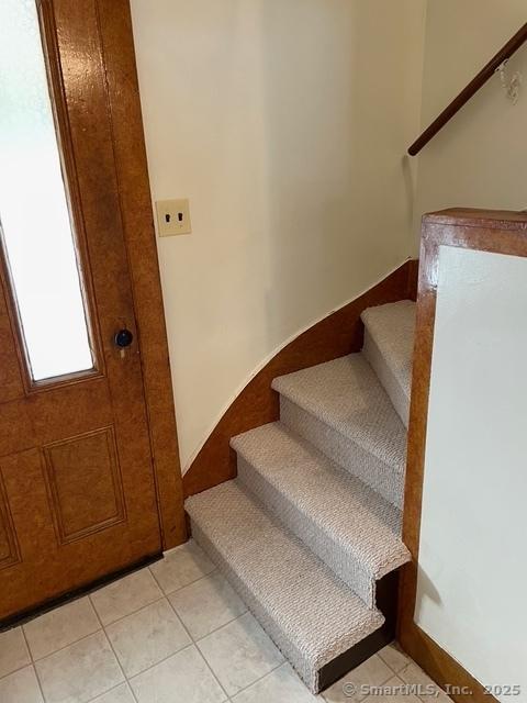 302 High St, Naugatuck, CT 06770 - stairs featuring tile patterned flooring