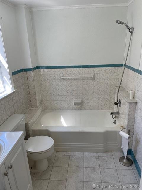 302 High St, Naugatuck, CT 06770 - full bathroom featuring vanity, a bathtub, tile walls, toilet, and tile patterned flooring