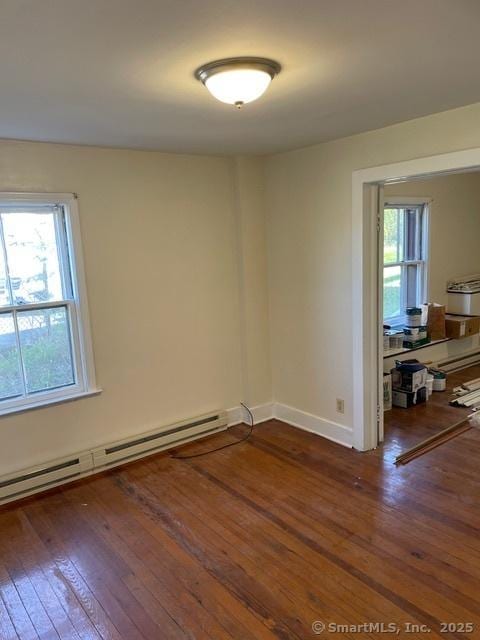 302 High St, Naugatuck, CT 06770 - spare room featuring hardwood / wood-style flooring, baseboards, and a baseboard radiator