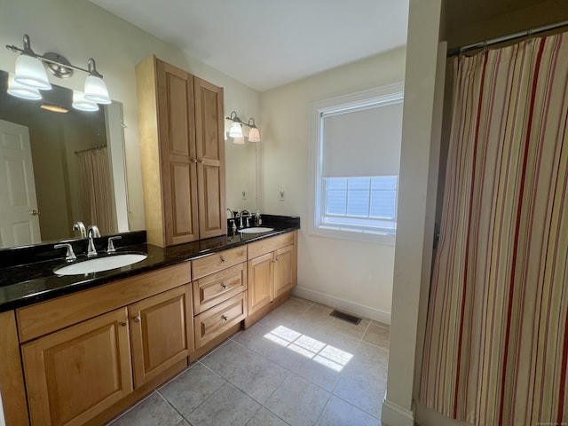 450 Naugatuck Ave Unit 450, Milford, CT 06460 - full bath featuring double vanity, baseboards, tile patterned flooring, and a shower with curtain
