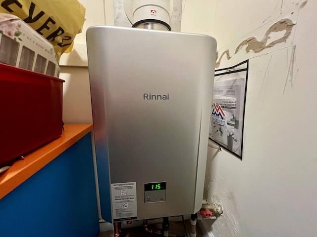 450 Naugatuck Ave Unit 450, Milford, CT 06460 - utility room with tankless water heater