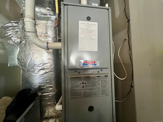 450 Naugatuck Ave Unit 450, Milford, CT 06460 - utility room with heating unit