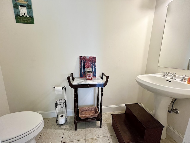 450 Naugatuck Ave Unit 450, Milford, CT 06460 - half bath featuring toilet and baseboards