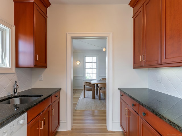 293 Lake Rd, Warren, CT 06777 - kitchen featuring dishwasher, a sink, light wood finished floors, and decorative backsplash