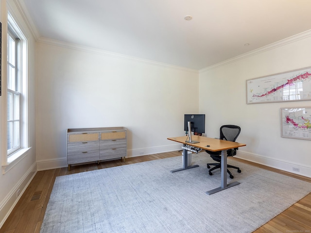 293 Lake Rd, Warren, CT 06777 - home office featuring crown molding, wood finished floors, and baseboards