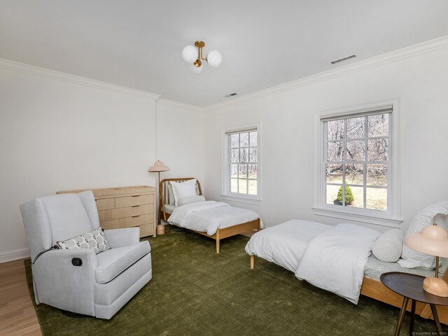 293 Lake Rd, Warren, CT 06777 - bedroom with crown molding and wood finished floors