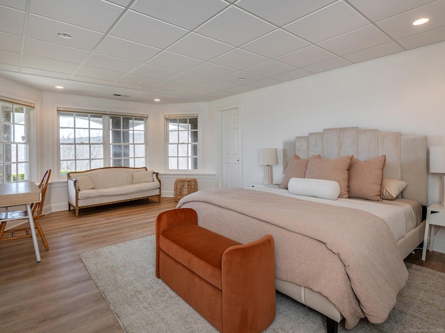 293 Lake Rd, Warren, CT 06777 - bedroom featuring wood finished floors, a drop ceiling, recessed lighting, and baseboards
