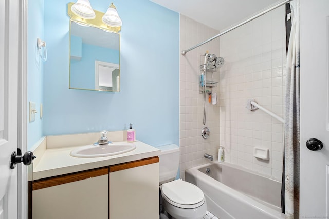 full bathroom featuring toilet, vanity, and washtub / shower combination