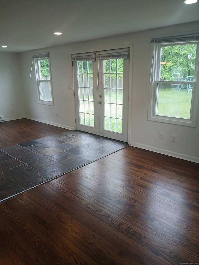 22 Bristol St, Wallingford, CT 06492 - empty room featuring french doors, wood finished floors, baseboards, and recessed lighting