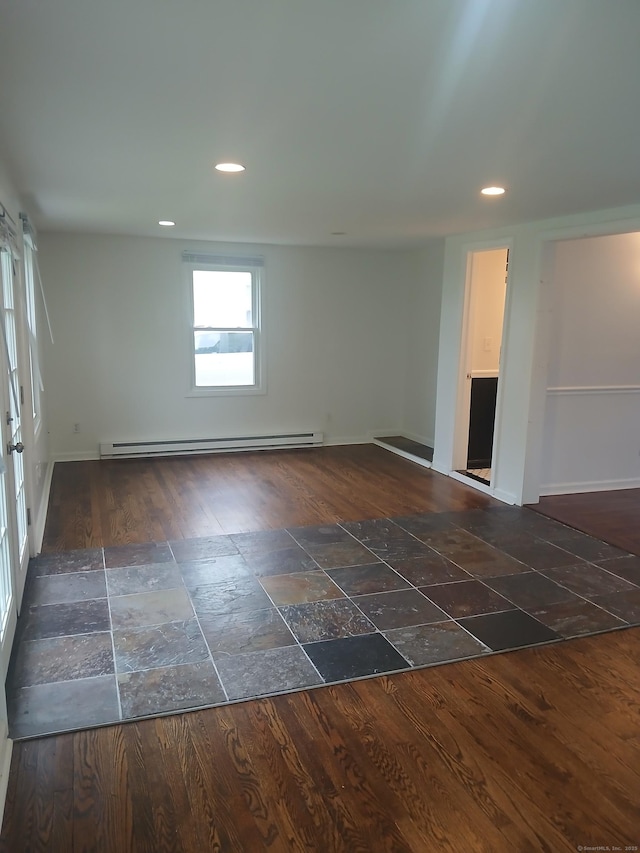 22 Bristol St, Wallingford, CT 06492 - empty room featuring recessed lighting, baseboards, a baseboard heating unit, and stone tile flooring