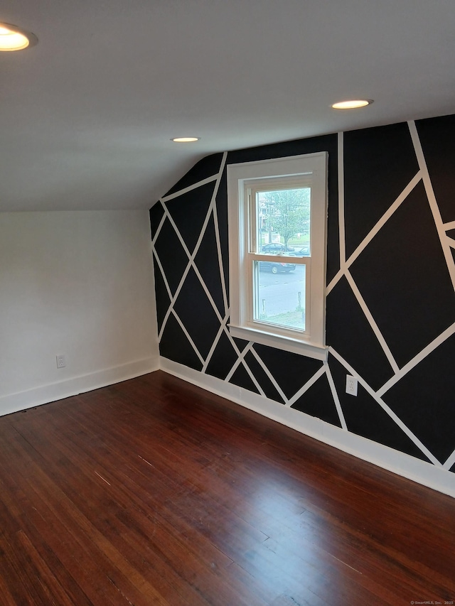 22 Bristol St, Wallingford, CT 06492 - bonus room featuring vaulted ceiling, baseboards, and wood finished floors