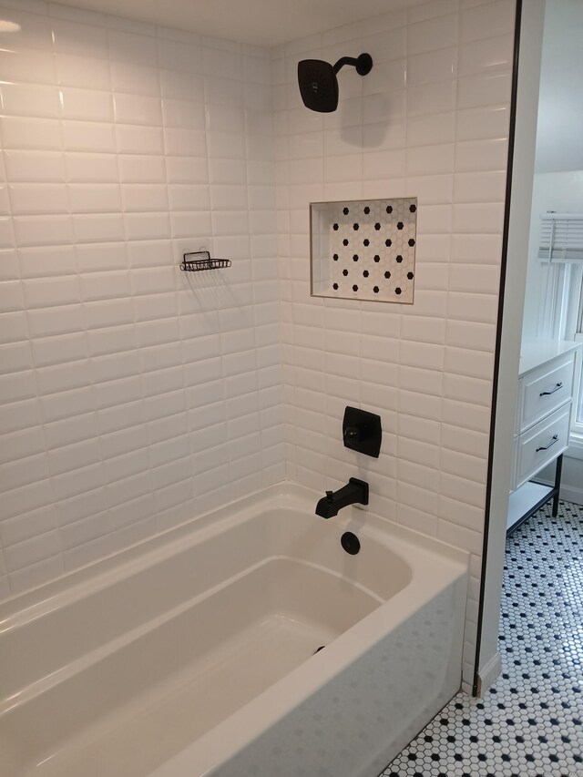 22 Bristol St, Wallingford, CT 06492 - full bathroom with washtub / shower combination and tile patterned floors