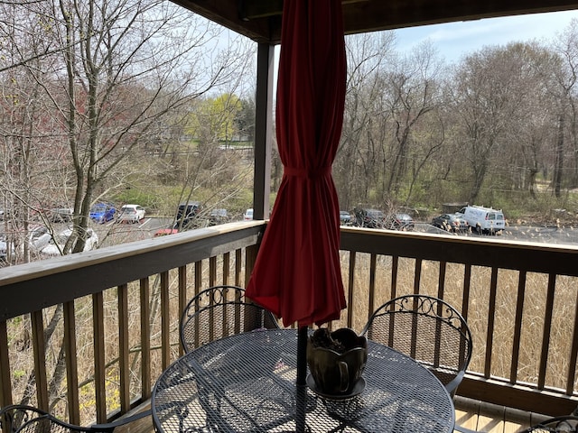 3699 Broadbridge Ave Unit 234, Stratford, CT 06614 - wooden deck featuring outdoor dining area