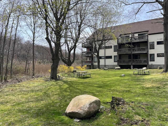 3699 Broadbridge Ave Unit 234, Stratford, CT 06614 - view of yard featuring a balcony