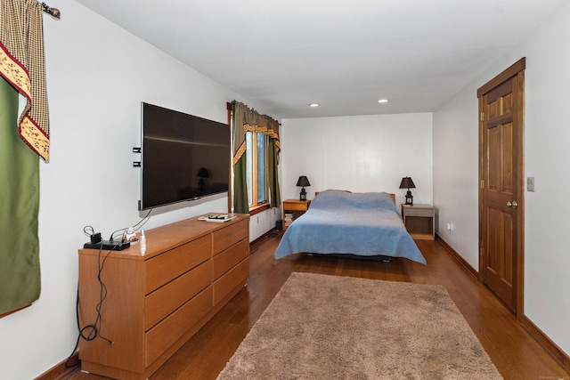 bedroom featuring baseboards, recessed lighting, and dark wood-style flooring