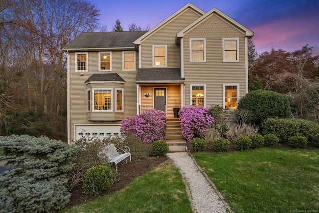 12 Canoe Brook Rd, Trumbull, CT 06611 - traditional home with an attached garage, a shingled roof, and a front yard