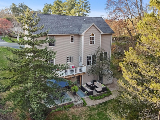 12 Canoe Brook Rd, Trumbull, CT 06611 - rear view of house with an outdoor living space, a patio area, a shingled roof, and a deck