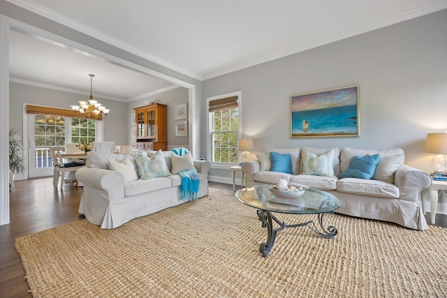 12 Canoe Brook Rd, Trumbull, CT 06611 - living room with wood finished floors, crown molding, a notable chandelier, and baseboards
