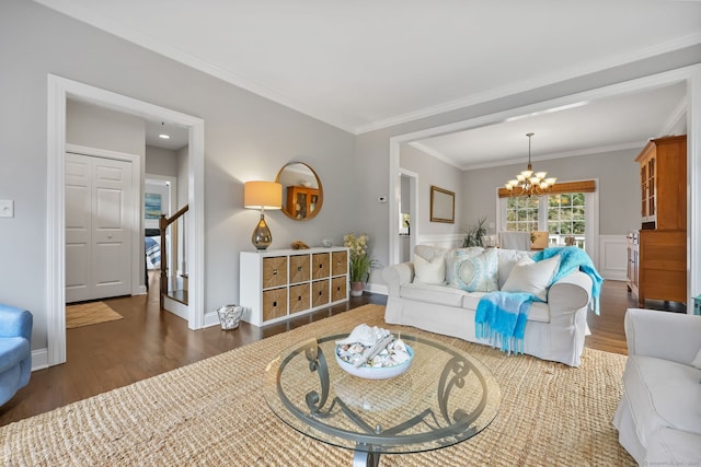 12 Canoe Brook Rd, Trumbull, CT 06611 - living room featuring wood finished floors, an inviting chandelier, stairs, and crown molding