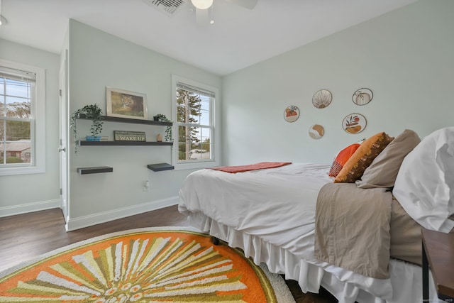 12 Canoe Brook Rd, Trumbull, CT 06611 - bedroom with wood finished floors, visible vents, baseboards, and multiple windows