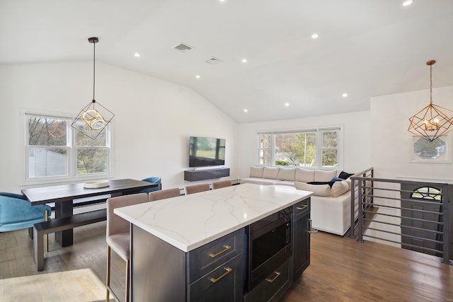 2 Benson Dr, Danbury, CT 06810 - kitchen with dark wood-style floors, vaulted ceiling, open floor plan, and built in microwave