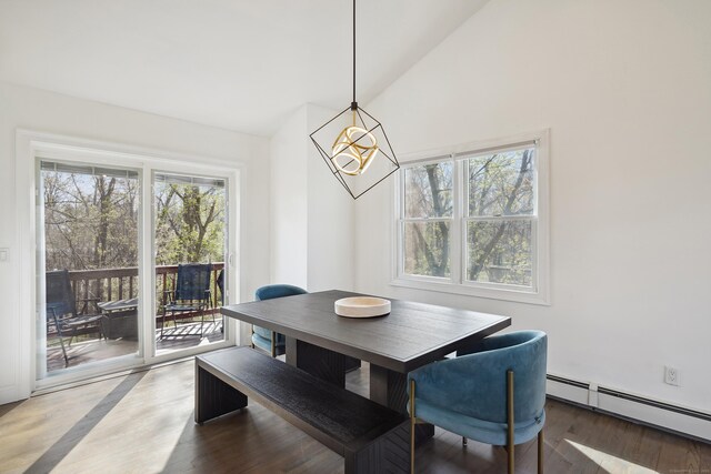 2 Benson Dr, Danbury, CT 06810 - dining area with a baseboard radiator, lofted ceiling, a notable chandelier, and wood finished floors