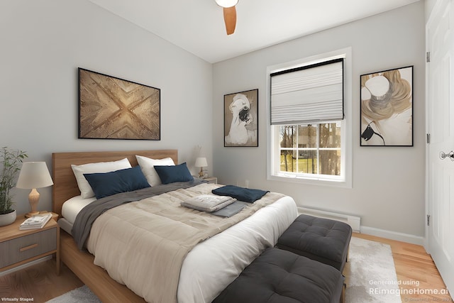 bedroom with baseboards, a ceiling fan, and light wood-type flooring
