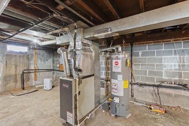 basement with water heater and heating unit