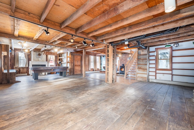 1156 Exeter Rd, Lebanon, CT 06249 - basement with hardwood / wood-style floors, wooden ceiling, rail lighting, and stairway
