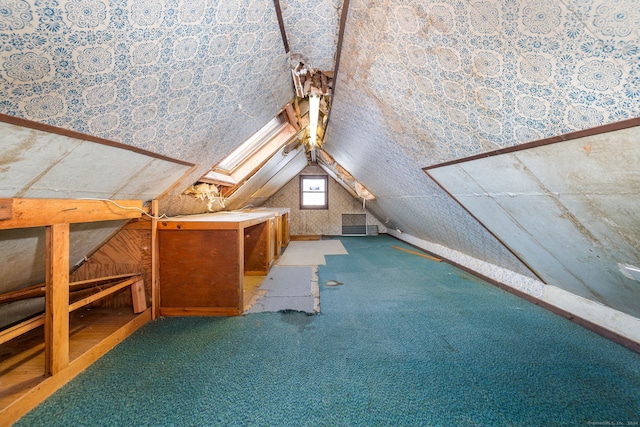 1156 Exeter Rd, Lebanon, CT 06249 - bonus room with wallpapered walls, carpet floors, and vaulted ceiling with skylight