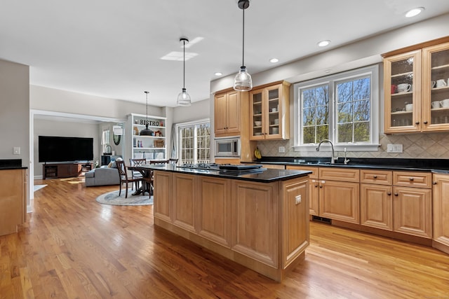 10 Granite Rd, New Milford, CT 06776 - kitchen with gas cooktop, dark countertops, a sink, and light wood finished floors