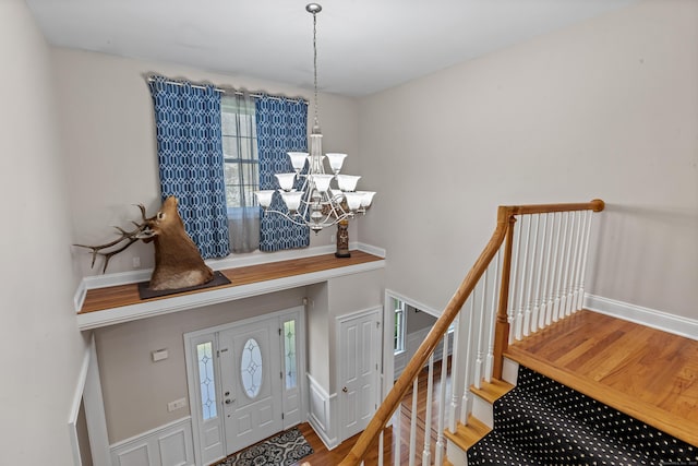 10 Granite Rd, New Milford, CT 06776 - entrance foyer featuring wood finished floors, a chandelier, and baseboards