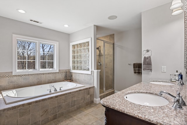 10 Granite Rd, New Milford, CT 06776 - full bathroom featuring a shower stall, tile patterned floors, visible vents, a sink, and a garden tub