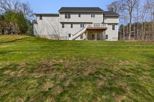 10 Granite Rd, New Milford, CT 06776 - back of property featuring a lawn, a chimney, stairs, and a wooden deck