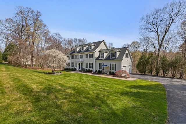10 Granite Rd, New Milford, CT 06776 - view of front facade with an attached garage, aphalt driveway, and a front lawn