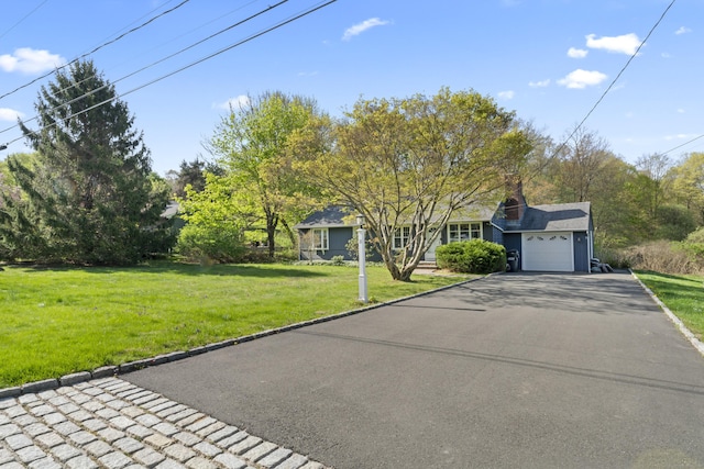 11 Knollwood Dr, Newtown, CT 06470 - ranch-style home with an attached garage, a chimney, a front yard, and aphalt driveway