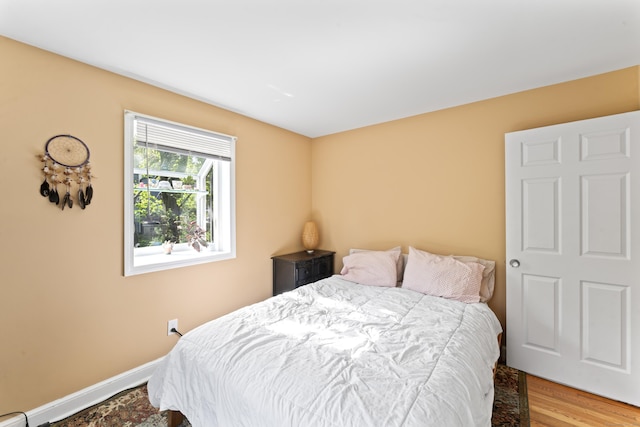 11 Knollwood Dr, Newtown, CT 06470 - bedroom featuring baseboards and wood finished floors
