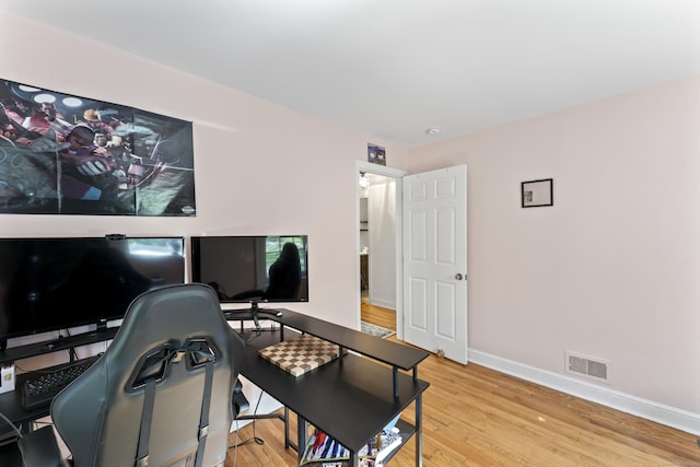 11 Knollwood Dr, Newtown, CT 06470 - home office with baseboards, visible vents, and light wood-style floors