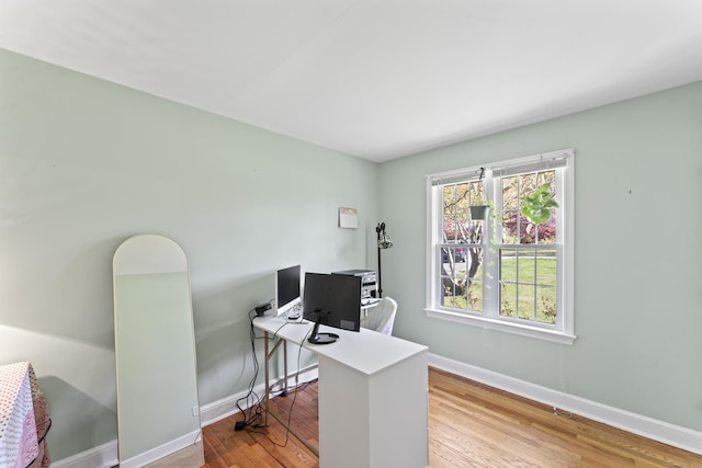 11 Knollwood Dr, Newtown, CT 06470 - home office with baseboards and wood finished floors
