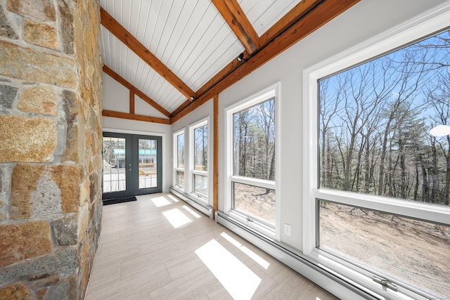 unfurnished sunroom featuring baseboard heating, high vaulted ceiling, beamed ceiling, and french doors