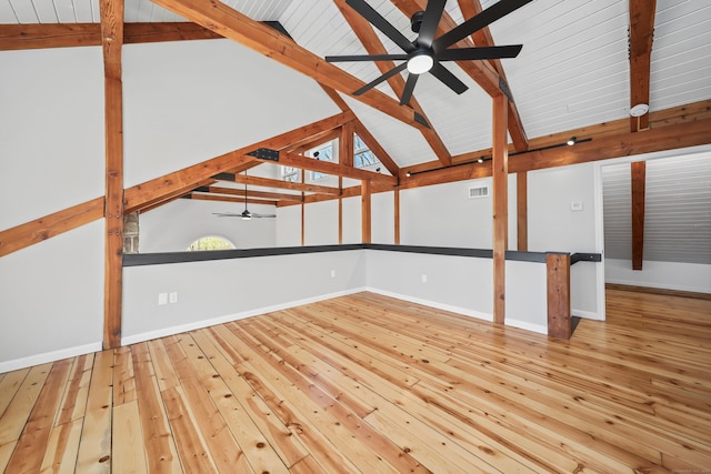 interior space with visible vents, vaulted ceiling with beams, ceiling fan, and hardwood / wood-style flooring