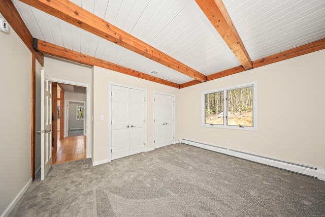 unfurnished bedroom featuring baseboards, beam ceiling, carpet floors, and a baseboard radiator