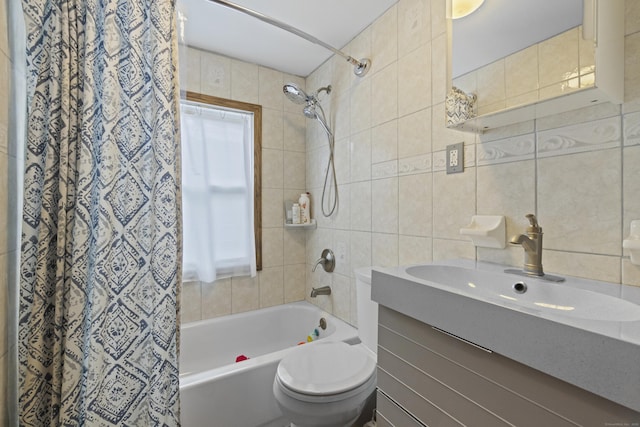 full bathroom featuring tile walls, vanity, shower / tub combo, and toilet