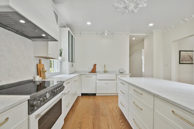 66 Seminary St, New Canaan, CT 06840 - kitchen featuring electric range oven, custom range hood, light wood-style flooring, white cabinets, and recessed lighting