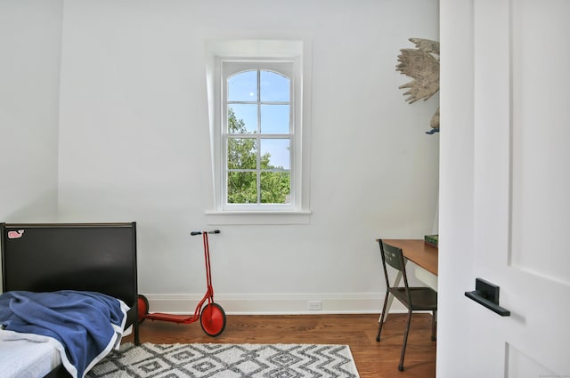 66 Seminary St, New Canaan, CT 06840 - bedroom featuring multiple windows and wood finished floors