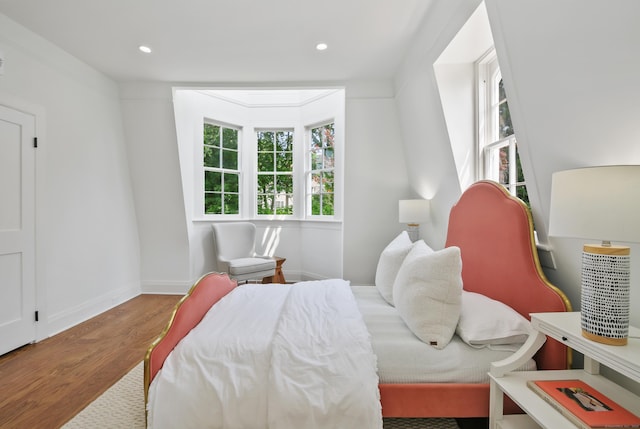 66 Seminary St, New Canaan, CT 06840 - bedroom featuring wood finished floors, multiple windows, and recessed lighting