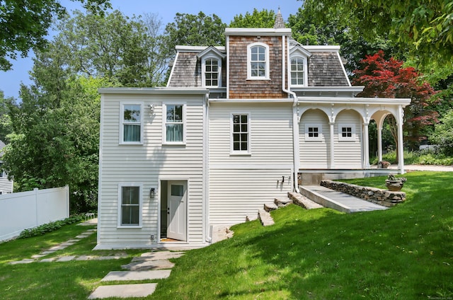 66 Seminary St, New Canaan, CT 06840 - rear view of property featuring mansard roof and roof with shingles